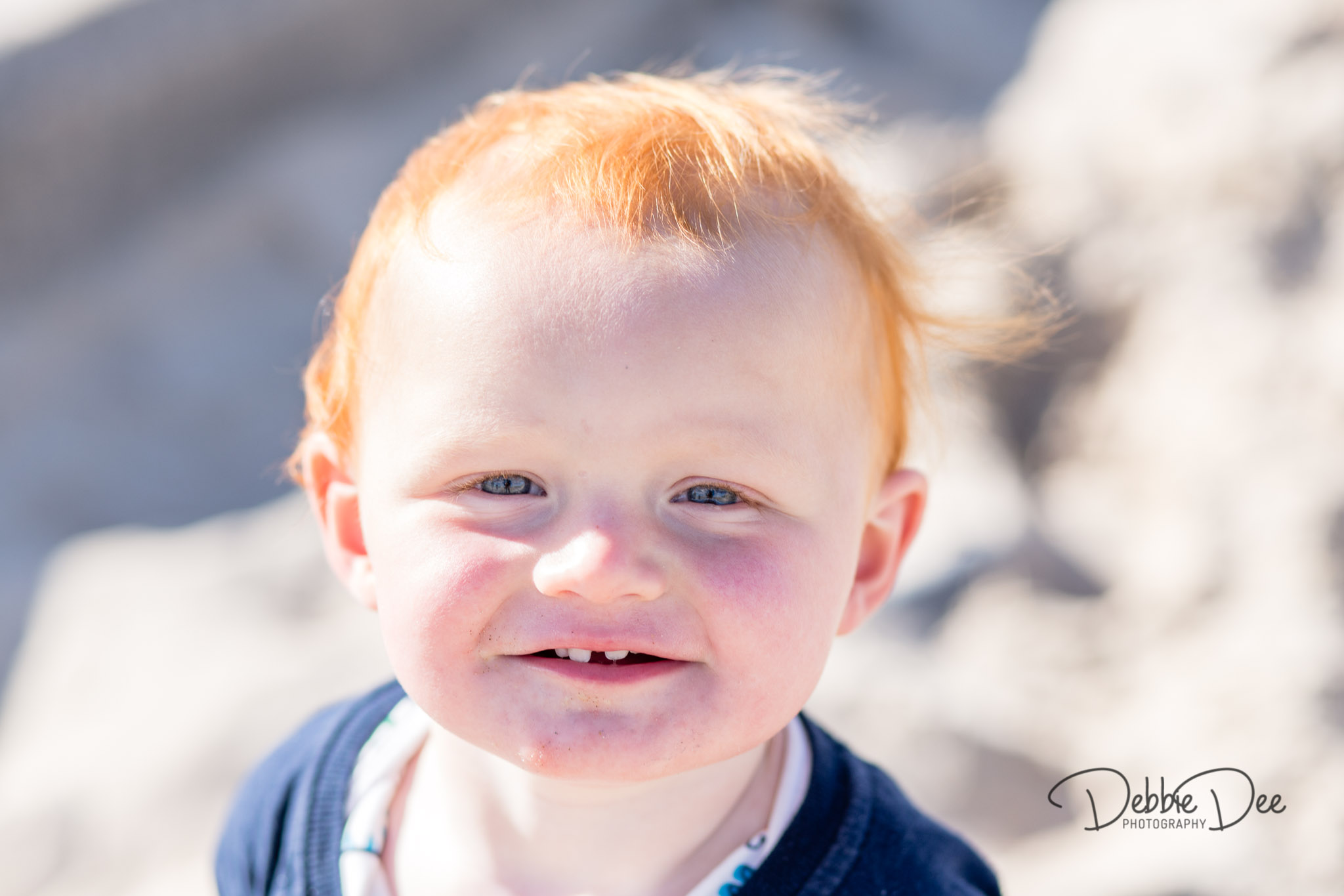 Family photography session banff beach aberdeenshire Debbie Dee Photography boy smiling