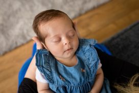 holding baby on knee while sleeping - baby photos aberdeen - newborn photographer aberdeenshire - Debbie Dee Photography